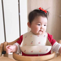 Babero de suplemento alimenticio para bebés